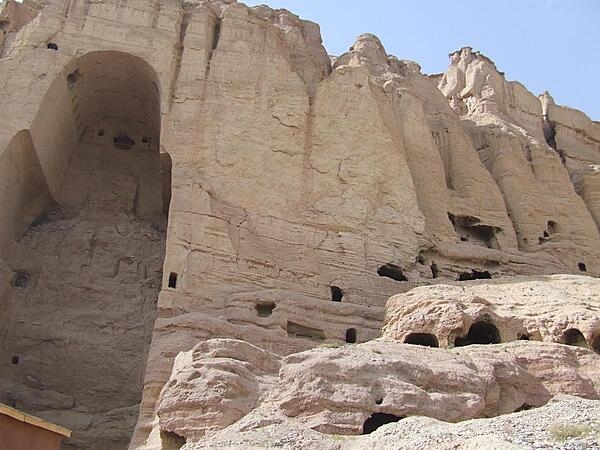 View of the shell of the &quot;Large Buddha&quot; and surrounding caves in Bamyan, Afghanistan. Over the centuries, travelers on the Silk Road often visited and described this Buddha statue and one in another cave, both dating to the sixth century A.D.  The Taliban destroyed both statues in 2001.