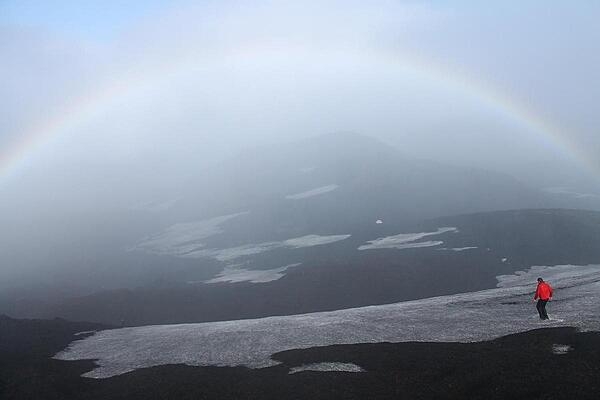 Descent down Hekla across the snowpack. Hekla is a stratovolcano in the south of Iceland and is one of the island's most active volcanoes, with more than 20 eruptions since the ninth century A.D.