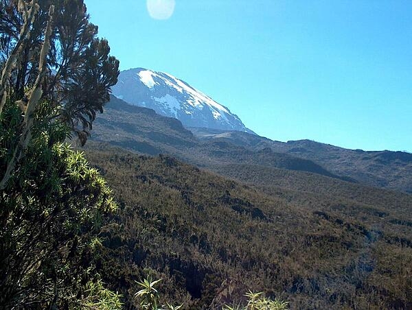 Mount Kilimanjaro in Tanzania is Africa’s highest mountain and the world’s tallest freestanding volcano at 5,895 m (19,341 ft) high. The origin of its name may be a combination of the Swahili word kilima, meaning “mountain,” and the KiChagga word njaro, loosely translated as “whiteness,” giving it the name “White Mountain.” A popular spot for tourists, Mount Kilimanjaro became a UNESCO World Heritage Site in 1987 and was named one of the Seven Natural Wonders of Africa in 2013.