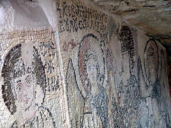 Mosaics in the Durres Amphitheater in Albania. The structure was built in the 2nd century A.D. and rediscovered in the late 1900s.  Still only half-unearthed, it could seat an estimated 20,000 people.