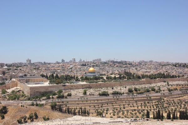 Jerusalem lies on a plateau between the Mediterranean and the Dead Sea; it is one of the oldest cities in the world, and is considered holy to the three major Abrahamic religions - Judaism, Christianity, and Islam. In 1538, the city walls were rebuilt around Jerusalem and now define the Old City, a World Heritage Site. Shown in the center of this view is the Dome of the Rock in Israeli-occupied East-Jerusalem.