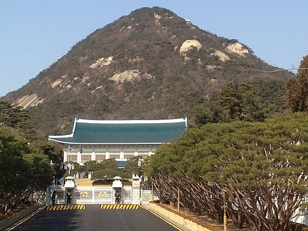 Closer view of Cheongwadae or the Blue House (literally "pavilion of blue tiles”), the former executive office and official residence of the president of the Republic of Korea. In May of 2022, the president of South Korea moved his residence to the Ministry of National Defense Building in Seoul.  Cheongwadae and its grounds were converted into a public park and opened to visitors for the first time in the country's history.