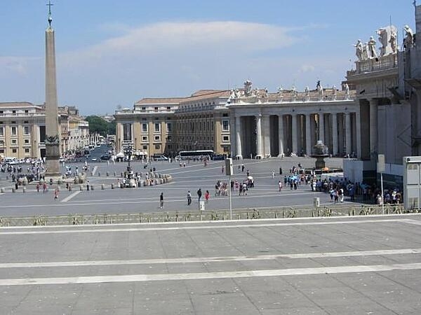 View of Saint Peter's Square in Vatican City, showing an Egyptian obelisk, the Via della Conciliazione, and colonnades with statues on the sides of the square. Gian Lorenzo Bernini designed the square, which was constructed between 1658 and 1667.