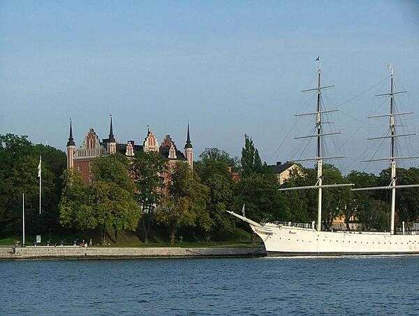 Admiralty House (built 1647-50) on the islet of Skeppsholmen in central Stockholm. Formerly occupied by the Royal Swedish Navy, it today houses the Swedish Tourist Association. The steel, full-rigged ship is the &quot;af Chapman.&quot; Built in the UK in 1888, it served as a training ship and made several trips around the world. No longer in active service, it presently is a youth hostel.