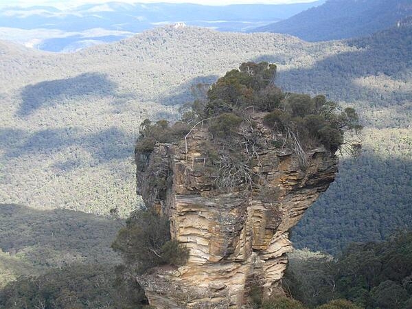 Orphan Rock in the Blue Mountains, Australia, as viewed from a cable car.