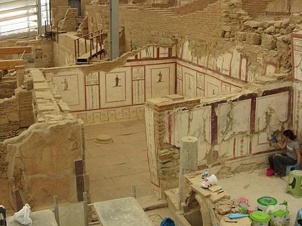 Terrace homes in Ephesus built on a hill opposite the Temple of Hadrian. The wealthy families lived here in six multi-family homes built on three terraces. Most homes were highly decorated and were heated by use of hot water flowing through pipes in the floors and walls. The roof of one house formed the patio or terrace of the house above it. Work on restoring the houses began in 1960.