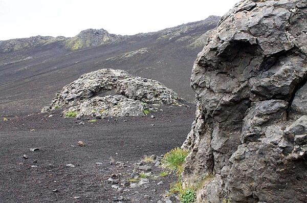 Pyroclastic rock bombs scattered about a crater in Iceland's Hekla Mountain Range.