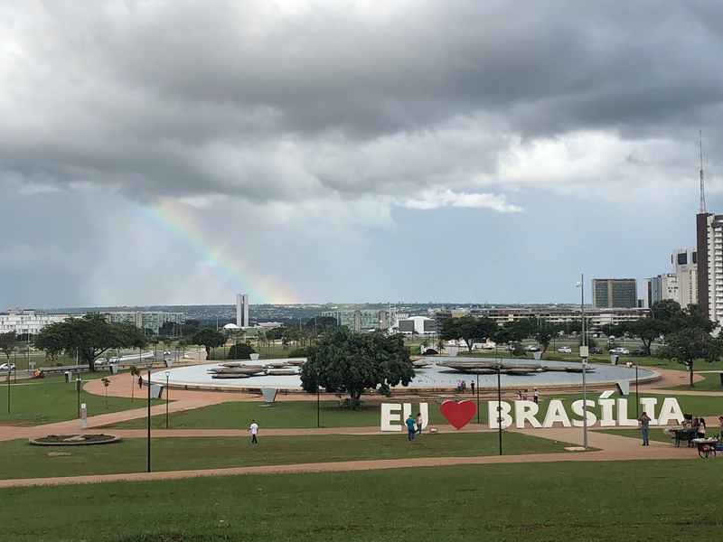 Brasilia, Brazil, is a planned city designed in the 1960s to be a modern Brazilian capital. The center of the city hosts a long mall with fountains and parks. From the hill at the center of the mall, you can see all the way to the Brazilian Parliament Building.