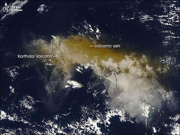 Karthala is one of two volcanoes that make up Grande Comore (or N'gazidja) Island in the Comoros archipelago. In this image from November 2005, Grande Comore appears only in outline as material from a recent eruption completely obscures the land surface. The volcanic ash ranges in color from tan to beige. The volcano has erupted about 20 times in the last century. Photo courtesy of NASA.