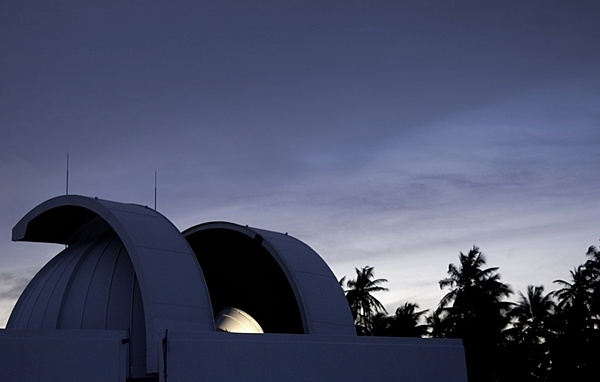 The dome of a one-meter telescope opens as it prepares to view and track space objects. The telescope is located at the Ground Based Electro-optical Deep Space Surveillance System in Diego Garcia in the British Indian Ocean Territory. Photo courtesy of US Air Force photo/Senior Airman Brian Ferguson.