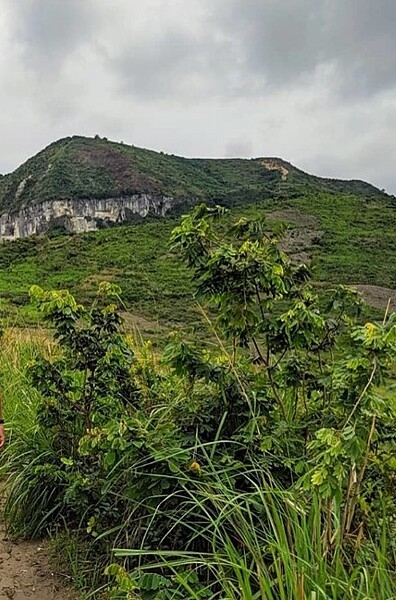 Mount Mangengenge is located southeast of Kinshasa in the Democratic Republic of Congo and overlooks the capital city; it is part of the Crystal Mountains range. The mountain is a pilgrimage site for many Congolese. The ascent is punctuated with crucifix sculptures, and the summit has a large cross.