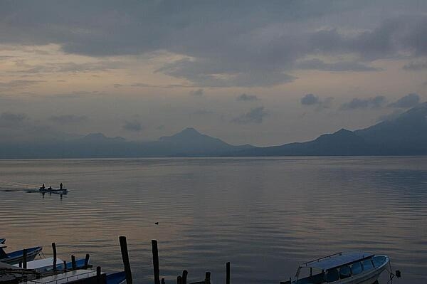 Guatemala's volcanic Lake Atitlan at sunrise, as the fishermen begin their day.