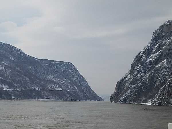 The Iron Gates is a gorge on the Danube River; it forms part of the boundary between Serbia and Romania. In the broad sense, it encompasses a route of 134 km (83 mi); in the narrow sense, it only includes the last barriers on this route - two hydroelectric dams and two power stations just beyond the city of Orsova.