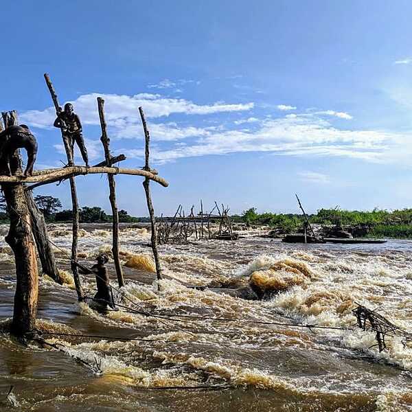 Boyoma Falls, formerly known as Stanley Falls, is a series of seven cataracts, each no more than 5 m (16 ft) high. The falls extend over 100 km (62 mi) along the Lualaba River between the port towns of Ubundu and Kisangani (also known as Boyoma) in the Democratic Republic of the Congo. The last of the seven cataracts is also known as the Wagenia Falls, referring to the local Wagenya fishermen, who use traditional woven baskets to fish in the river.