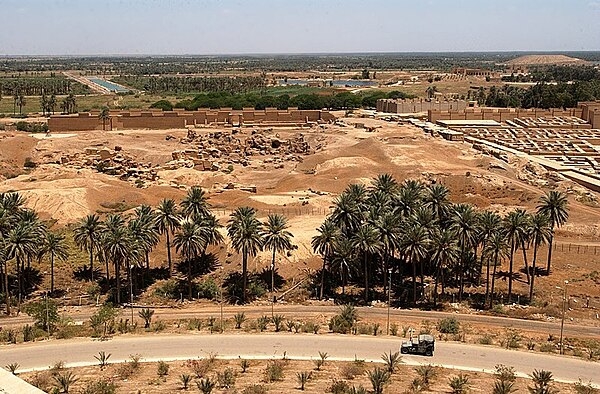 View from Iraqi leader Saddam Hussein's former summer palace, showing the ruins of ancient Babylon in the background. Photo courtesy of the US Navy/ Arlo K. Abrahamson.