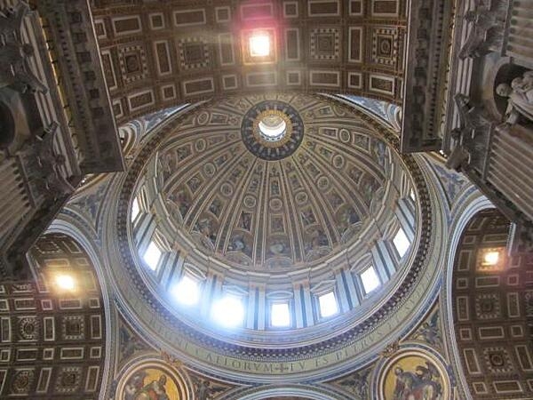 Michelangelo designed the dome over the main altar in Saint Peter's Basilica in Vatican City in 1547; it was completed in 1590 after his death. The dome is 136.57 m (448.1 ft) high, making it the tallest dome in the world.