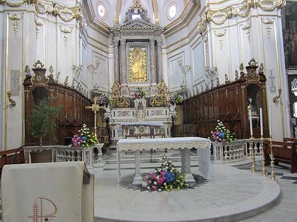 Altar inside the church Our Lady of the Assumption in Positano on the Amalfi Coast. Above the altar is a 13th century Byzantine Black Madonna and Child.