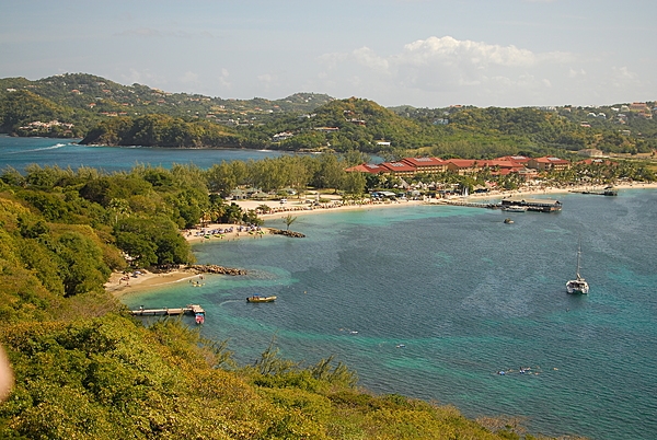 Pigeon Island is a former islet (180,000 sq m; 44 acres) off the north point of Saint Lucia joined to the mainland in 1972 by a man-made causeway - built from the town of Gros Islet with soil excavated to form the Rodney Bay Marina.  This view is from the top of Pigeon Island looking back toward the causeway and the main island.