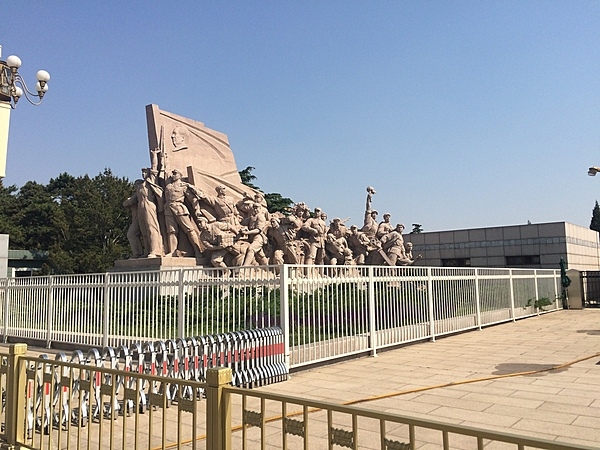 Revolutionary monument in front of Chairman Mao Zedong Mausoleum on Tiananmen Square in Beijing, China.