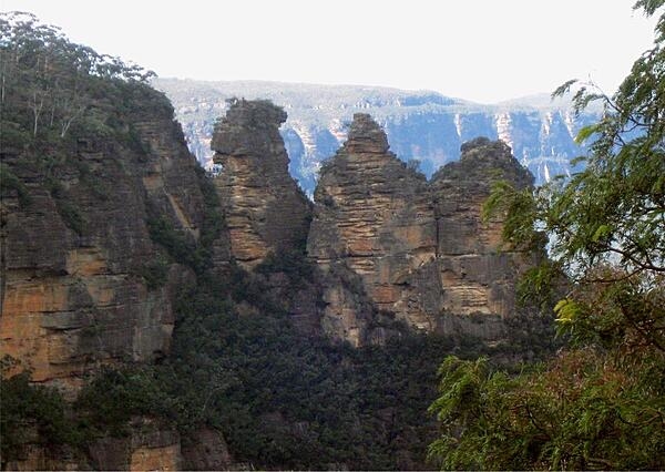 The Three Sisters are a rock formation found in the Greater Blue Mountains of New South Wales, Australia, on the north escarpment of the Jamison Valley.  Their names are Meehni 922 m (3,024 ft), Wimlah 918 m (3,011 ft), and Gunnedoo 906 m (2,972 ft).