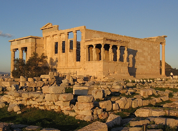 Located on the north side of the Acropolis in Athens, Greece, the Erechtheion is an ancient Greek temple that was dedicated to Athena, Poseidon, and the legendary Greek hero Erichthonius. Built between 421 and 406 B.C., the temple's north side has a large porch with six Ionic columns, and the south has the famous "Porch of the Maidens", with six draped female figures (caryatids) as supporting columns.