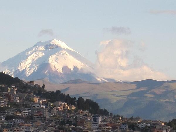 Located 28 km (17 mi) from Quito, Ecuador, is snow-capped Cotopaxi, a volcano that last erupted in the 1940s.  It is the second highest peak in the country, reaching a height of 5,897 m (19, 347 ft).