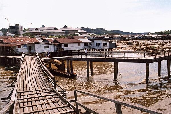 Bandar Seri Begawan is the capital and largest city of the Sultanate of Brunei. The water village of Kampong Ayer, with houses on stilts, lies within its boundaries and stretches about 8 km (5 mi) along the Brunei River. The self-contained settlement is equipped with schools, police stations, clinics, a waterborne fire brigade, and mosques, all connected by walkways and bridges.