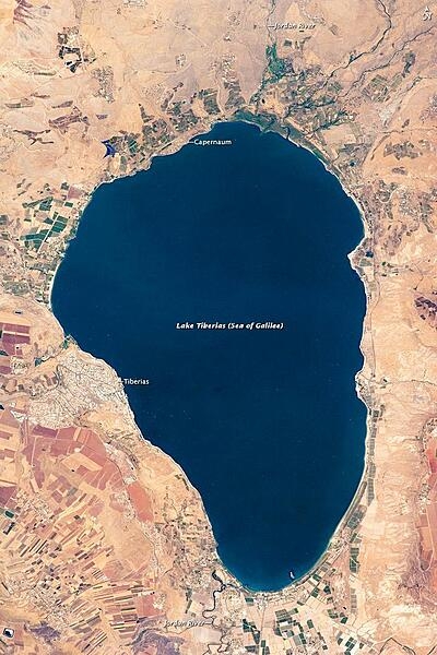 Israel's largest freshwater lake, Lake Tiberias (pictured), is also known as the Sea of Galilee. The lake measures just over 21 km (13 mi) north-south, and it is only 43 m (141 ft) deep. The Jordan River's winding course can be seen draining the south end of the lake at image bottom. Green and brown patterns cover most hillsides. Bright roof tops are the hallmark of several villages in the area. Much of the area to the east of the lake is part of the Israeli-occupied Golan Heights. Image courtesy of NASA.