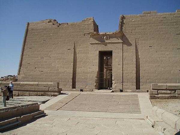 Pylons of the Temple of Isis and the Nubian solar and fertility deity, Madulis, at Kalabshah, Egypt.  It is the largest free-standing Nubian temple. Construction began in A.D. 23 during the reign of the Roman Emperor Octavius Augustus. The temple was moved 48 km (30 mi) north when the High Dam was built in 1970.