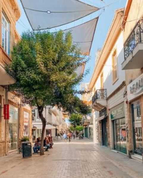 Ledra Street is in the middle of Cyprus's divided capital city of Nicosia. Now a busy shopping center, it has figured prominently in its nation’s history as the site of several battles. At 1 km  (0.6 mi) long, it hosts part of the buffer zone established along the ceasefire line that separates the northern Turkish-controlled part of the island from the south.