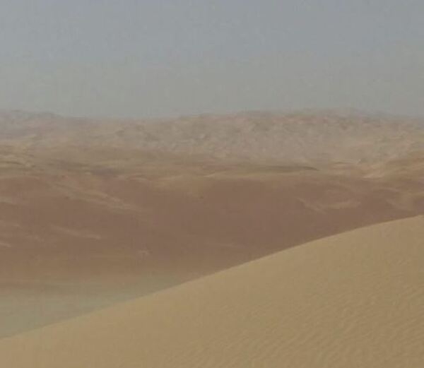 South and west of Abu Dhabi, vast, rolling sand dunes merge into the Rub' al Khali (Empty Quarter). The Rub' al Khali  is a sand desert encompassing the southern third of the Arabian Peninsula, including southern Saudi Arabia, and areas of Oman, the United Arab Emirates, and Yemen. The desert covers some 650,000 sq km (250,000 sq mi).