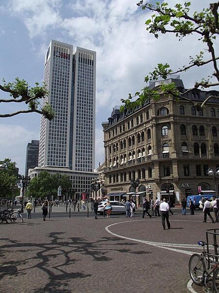 The Operturm (Opera Tower) in Frankfurt, Germany, was opened in 2010 and is named after the Alte Oper (Old Opera House) that it faces, a corner of which may be seen in the center of the photo.