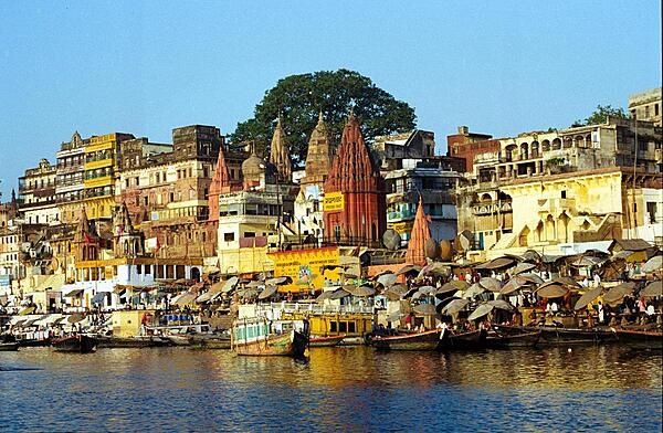 Varanasi, located on the west bank of the River Ganges in the state of Uttar Pradesh, India, is one of the oldest continuously inhabited cities in the world and is often referred to as the religious capital of India.  Pilgrims journey to Varanasi to cleanse their spirits in the river.