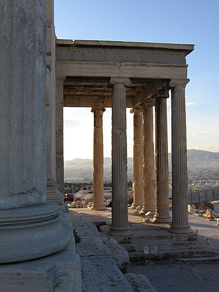 Built between 421 and 406 B.C., the Erechtheion is an ancient Greek temple on the north side of the Acropolis in Athens, Greece. The temple is dedicated to Athena, Poseidon, and the legendary Greek hero Erichthonius. The north side of the Erechtheion displays a large porch with six Ionic columns.