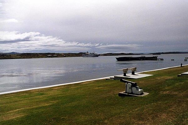 A shoreline view of Stanley, Falkland Islands, with a cruise ship in the background. Stanley is the islands' main shopping area (population about 2,100).