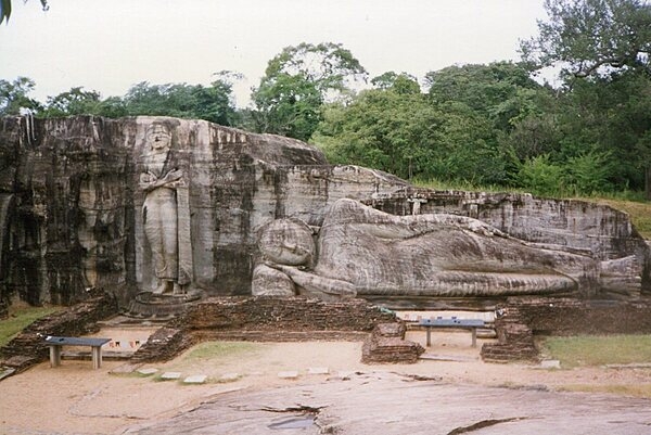 The Gal Vihara (stone temple or rock monastery), known originally as the Uttararama, is a rock temple of the Buddha located in the ancient city of Polonnaruwa in North Central Province, Sri Lanka. It was carved during the reign of Parakramabahu I (1153-1186). The temple consists of four rock relief statues of the Buddha, which have been carved into the face of a single granite outcropping. The reclining Buddha is just over 14 m (46 ft) in length, making it one of the largest sculptures in South Asia. The city of Polonnaruwa has been designated a World Heritage Center.