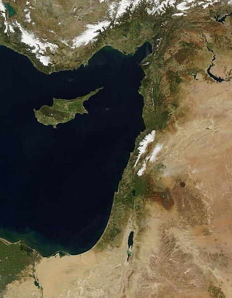 The Levant, the eastern coast of the Mediterranean Sea, is vividly displayed on this satellite image. Cyprus's distinctive shape points to the Gulf of Iskenderun in southern Turkey. Other Levant countries in a clockwise direction are Syria, Lebanon, Israel, and Egypt. Snow appears clearly in the mountains of Turkey (top) and Lebanon (center) and in thin strips in the highlands of Syria. The contrast between the well-watered northern half of Israel and the desert south is starkly evident. Photo courtesy of NASA.