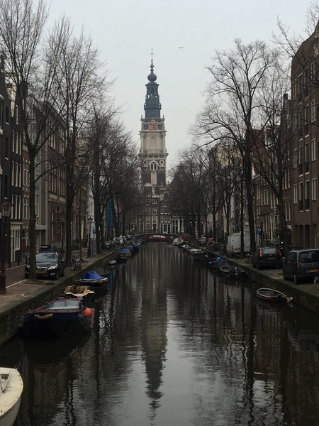 Spiegelgracht canal sits along the path from the Rijksmuseum to Amsterdam's city center. In the holiday season, lights decorate all of the trees along the canals.