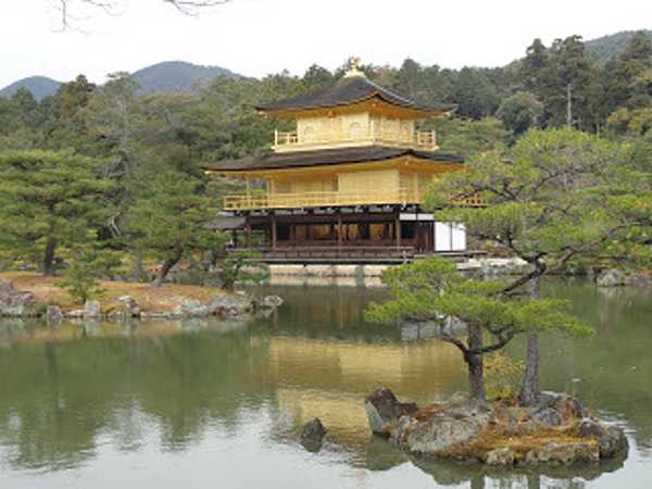 Kinkaku-ji  or "Temple of the Golden Pavilion,"  is a Zen Buddhist temple in Kyoto and one of the most popular buildings in the country, attracting thousands of visitors annually. Designated as a National Special Historic Site and a National Special Landscape, it is one of 17 locations making up the Historic Monuments of Ancient Kyoto that are World Heritage Sites.