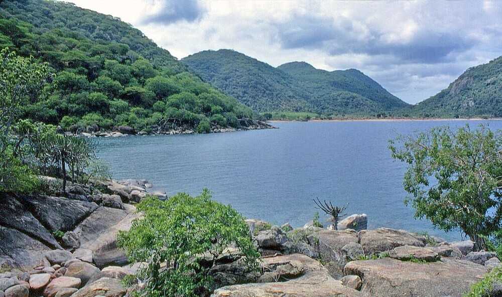 Malawi’s Lake Malawi, 580 km (360 mi) long, is the country's most prominent geographical feature and contains more fish species than any other lake on earth. Lake Malawi is the fourth-largest freshwater lake in the world by volume, the ninth-largest lake in the world by area, and the third-largest and second-deepest lake in Africa.