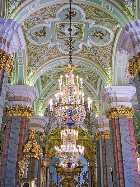 Pastel colors highlight the central nave of the Saints Peter and Paul Cathedral in Saint Petersburg. The Cathedral is located inside the Peter and Paul Fortress and houses the remains of almost all Russian emperors (and empresses) from Peter I to Nicholas II.