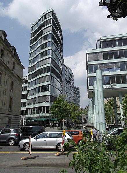 An eccentric office building weaves its way through the financial district of Frankfurt, Germany.