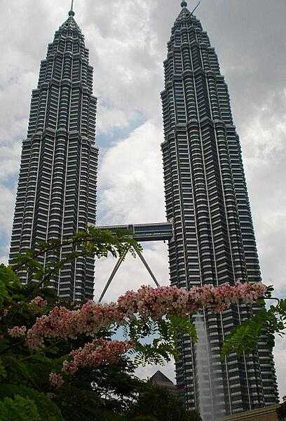 Petronas Towers close up showing the double-decker walkway between the towers.