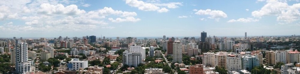 Santo Domingo is the capital of the Dominican Republic. Founded in 1496 by Christopher Columbus, it is the oldest continuously inhabited European settlement in the Americas, with the region's first cathedral, hospital, customs house, and university. The town was laid out in a grid pattern that became the model for almost all town planners in the New World.