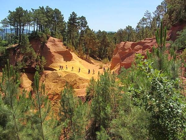 Much of the architecture in Roussillon, France, is colored with earthen tones from a nearby ocher quarry.