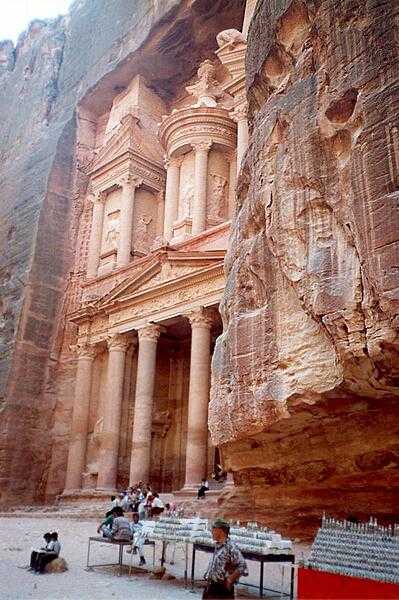 Petra, Jordan, was the capital of the Nabatean Kingdom, which flourished from the third century B.C. until its incorporation into the Roman Empire in A.D. 106. The photo shows one of Petra's most elaborate buildings, which was carved into the cliff face in the 2nd century B.C.  Dubbed the "Treasury" (Al-Khazneh),  the structure was likely the mausoleum of a Nabatean king.