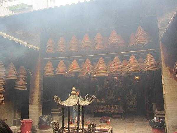 The Man Mo Temple in Tai Po, Hong Kong is 26 km (16 mi) from the harbor. The temple is dedicated to Man (literature) and Mo (military) and was built in 1893 in the style of a central walled compound to emphasize seclusion.