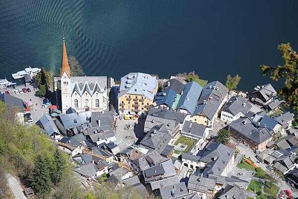 Hallstatt is a picturesque town on the shores of Hallstaetter See in the Austrian Alps, and it is a UN World Heritage Site. A funicular in the town takes visitors to the bluff above the city, from which this "aerial" photo was taken.