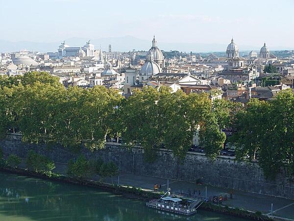 The ancient and historic city of Rome, Italy, showing the dome of the Pantheon on the left, the Monument of Victor Emanuel II in the left background, and various other church domes.