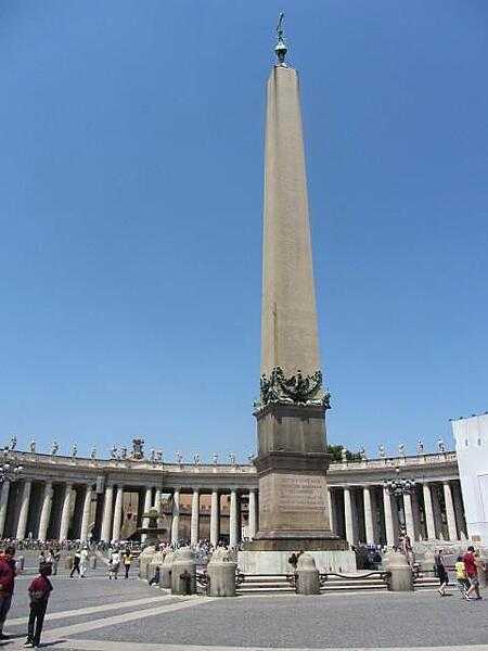 An Egyptian obelisk in Saint Peter's Square in Vatican City. Composed of red granite, the obelisk is 25.5 m (84 ft) tall, or 41 m (134.5 ft) to the top of the cross. The Emperor Caligula transferred it to Rome in A.D. 37, and it was moved to its current location at the direction of Pope Sixtus V in 1586.